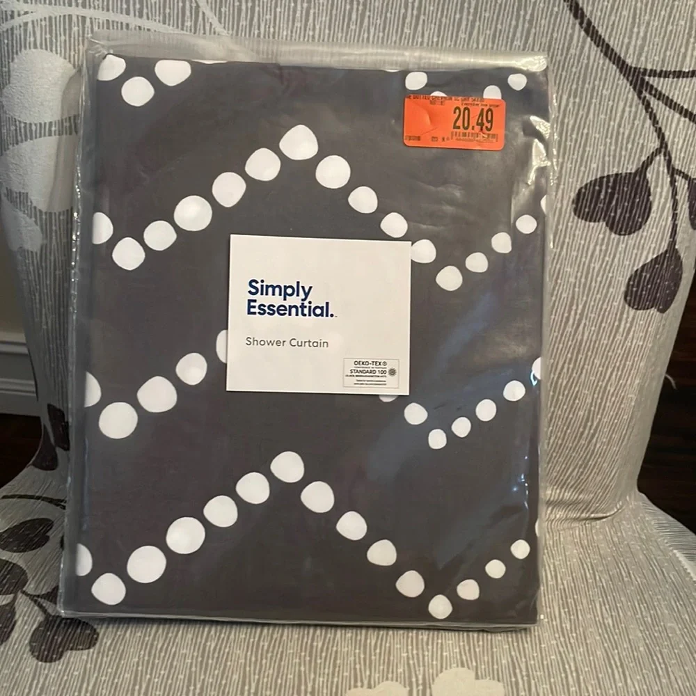 Shower curtain dark gray with white dotted chevron pattern. Great accent